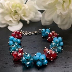 Handmade red and blue pinned bracelet